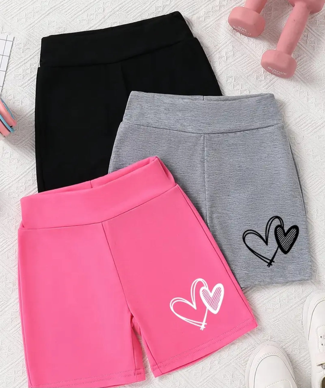Girls' 3-Pc High Waisted Shorts Set featuring black, gray, and pink shorts with cute heart print, perfect for casual summer wear.